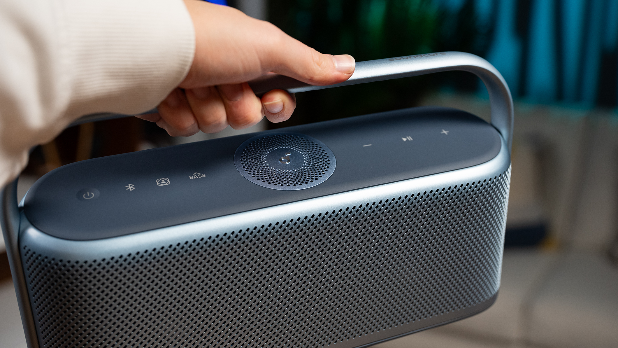 Anker Soundcore Motion X600 in hand Anker Soundcore Motion X600 held by a hand.