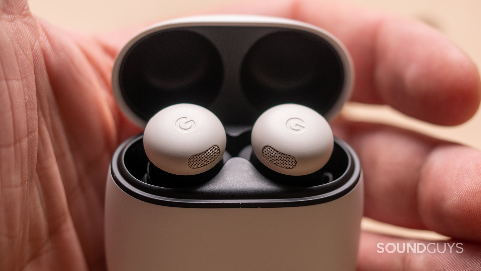 google-pixel-buds-pro-2-hand A close up photo of the Google Pixel Buds Pro 2 in someone's hand.