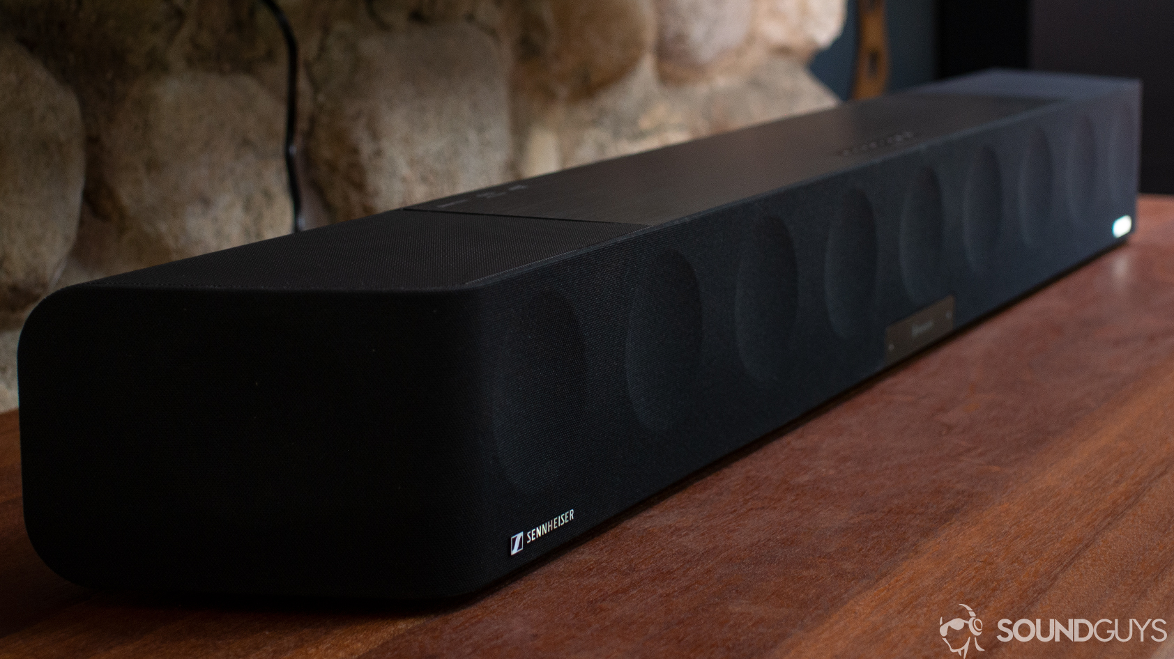 sennheiser-ambeo-soundbar The Sennheiser Ambeo Soundbar on a wooden desk.