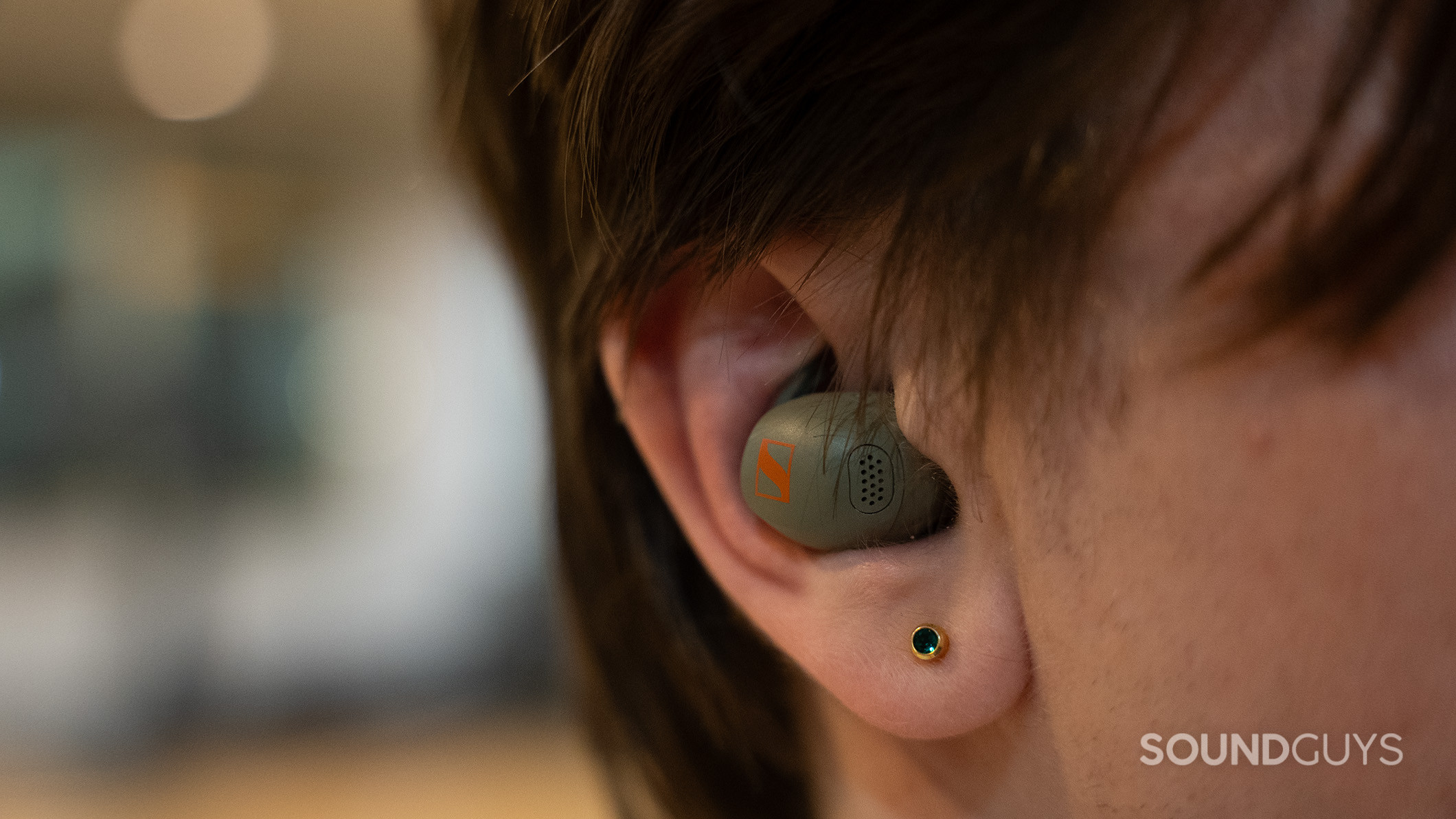 Sennheiser MOMENTUM Sport earbud in ear 2 A Sennheiser MOMENTUM Sport earbud inside an ear.
